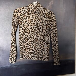 Jcrew turtle neck 
Leopard print